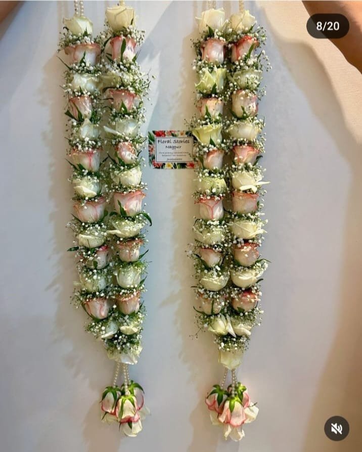 Trending Fresh Garland: Elegant Roses with Delicate Gypsophila
